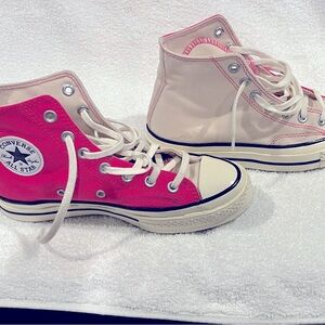 Size 7 half pink half white converse high top. Hardly worn. Super cool